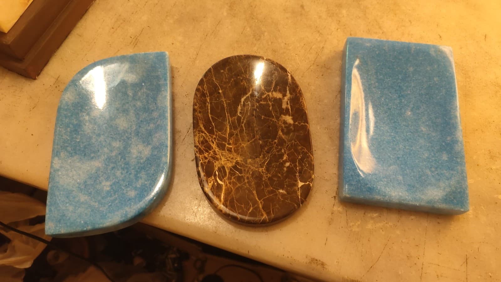 three small marble trays